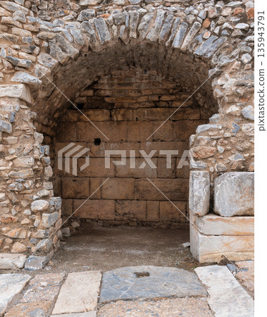 Ancient stone archway and chamber ruins at Ephesus, Selcuk, Turkey Ancient stone archway and chamber ruins at Ephesus, Selcuk, Turkey 135943791