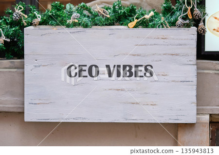 A captivating sign displays the phrase CEO vibes, positioned against a backdrop of lush greenery. This scene captures the essence of ambition, creativity, and leadership in a modern setting A captivating sign displays the phrase CEO vibes, positioned against a backdrop of lush greenery. This scene captures the essence of ambition, creativity, and leadership in a modern setting 135943813