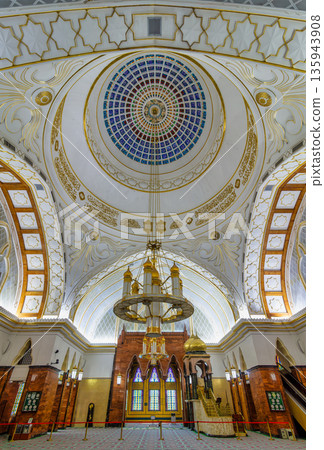 Ornate interior of Omar Ali Saifuddien Mosque with dome, chandelier, and stained glass, Bandar Seri Begawan Brunei 135943908