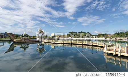 Mahligai Royal Barge and pavilion reflected in the lagoon of Sultan Omar Ali Saifuddien Mosque, Bandar Seri Begawan, Brunei 135943944