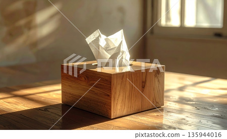 An open old wooden crate gift box holds a single brown candle isolated on a white background as a storage object An open old wooden crate gift box holds a single brown candle isolated on a white background as a storage object 135944016