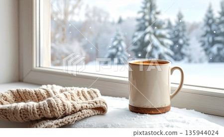 A hot cup of tea and sweet cookies rest on a brown wooden table by a window, creating a cozy morning breakfast scene with a white saucer and winter dessert A hot cup of tea and sweet cookies rest on a brown wooden table by a window, creating a cozy morning breakfast scene with a white saucer and winter dessert 135944024