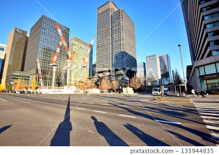 An intersection with shadows stretching towards Gyoko-dori An intersection with shadows stretching towards Gyoko-dori 135944835