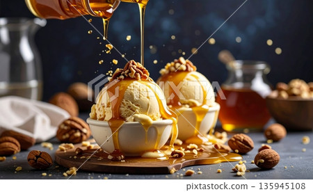 A delicious gourmet dessert of chocolate ice cream served in a white bowl with fresh chocolate sauce makes a sweet and healthy snack A delicious gourmet dessert of chocolate ice cream served in a white bowl with fresh chocolate sauce makes a sweet and healthy snack 135945108