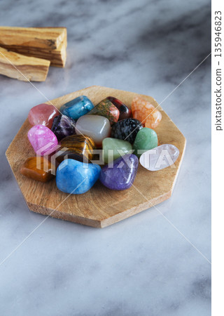 Colorful Healing Crystals Collection on Wooden Plate, Flat Lay 135946823