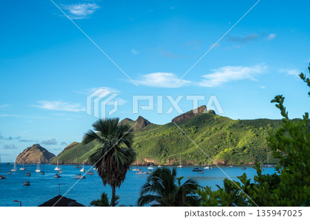 Taiohae Bay with anchored sailboats in Nuku Hiva, Marquesas Islands, French Polynesia 135947025