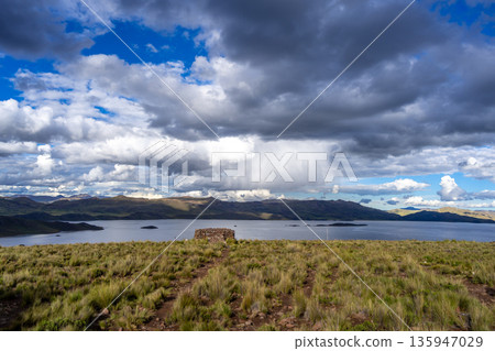 Storm clouds over Lake Lagunillas in the Peruvian highlands Storm clouds over Lake Lagunillas in the Peruvian highlands 135947029