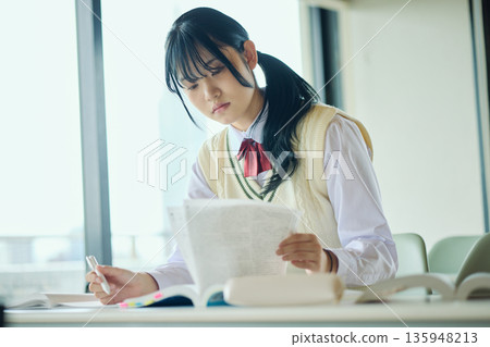 High school girls studying hard for exams 135948213