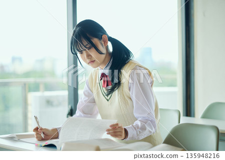High school girls studying hard for exams 135948216