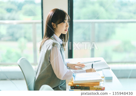 Female students taking classes Female students taking classes 135948430