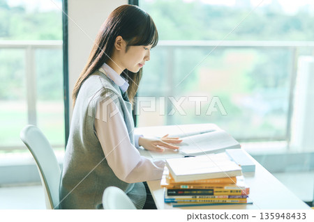 Female students taking classes 135948433
