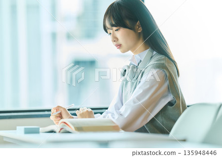 Female students taking classes 135948446