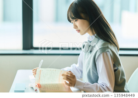 Female students taking classes 135948449