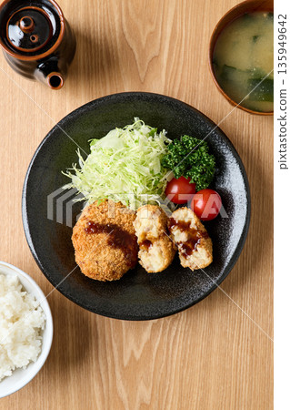 Potato croquettes with sauce 135949642