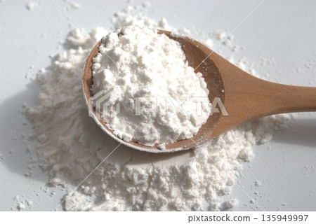 Rice flour on a spoon Rice flour on a spoon 135949997