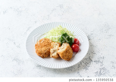 Potato croquettes on a plate Potato croquettes on a plate 135950538