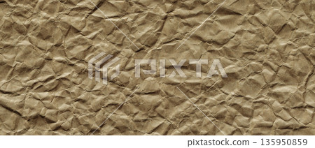 Crumpled Brown Kraft Paper Texture Background with Wrinkled Surface Pattern Copy Space Crumpled Brown Kraft Paper Texture Background with Wrinkled Surface Pattern Copy Space 135950859