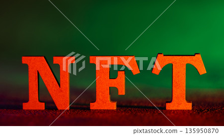 Red Orange NFT Letters on Dark Green Background Non-Fungible Token Cryptocurrency Concept Red Orange NFT Letters on Dark Green Background Non-Fungible Token Cryptocurrency Concept 135950870