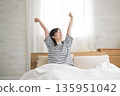 Woman waking up 135951042