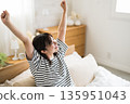 Woman waking up 135951043