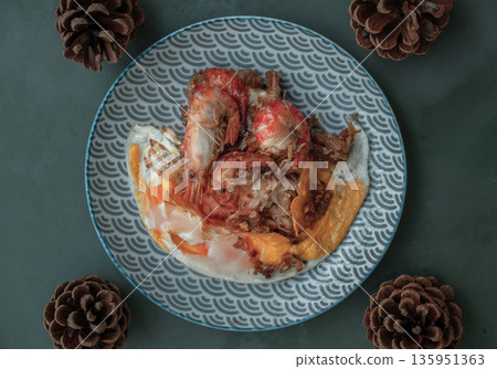 Tasty appetizing garlic Prawns, Shrimps on frying pan with Fried eggs in a frying on a japanese dish. Top View with Copy space. 135951363