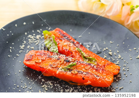 Sweet roasted carrots with cheese Sweet roasted carrots with cheese 135952198