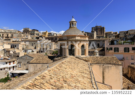View from the bell tower of the duomo of San Giorgio, an old dome in the historical city center of Modica, Sicily, Italy 135952222