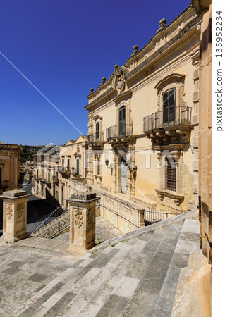 View of a building facade of the baroque town of Modica in the province of Ragusa in Sicily, Italy 135952234