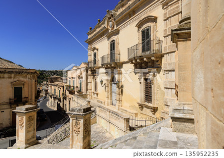 View of a building facade of the baroque town of Modica in the province of Ragusa in Sicily, Italy 135952235