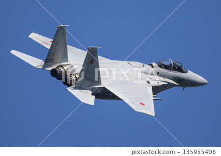 Fighter flying in the blue sky Fighter flying in the blue sky 135955408