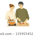 Couples cooking together in the kitchen 135955452