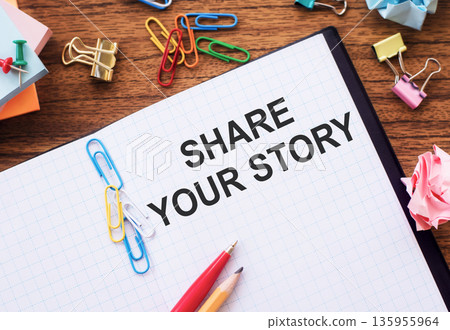 Business concept - Top view notebook writing Share Your Story 135955964