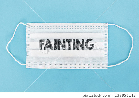 On the protective for the letter text FAINTING On the protective for the letter text FAINTING 135956112
