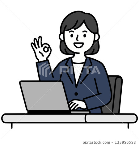 A woman in a navy suit smiling and giving an OK sign in front of a PC A woman in a navy suit smiling and giving an OK sign in front of a PC 135956558