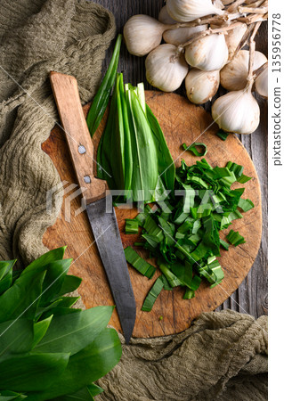 Fresh wild garlic leaves with garlic bulbs chopped Fresh wild garlic leaves with garlic bulbs chopped 135956778