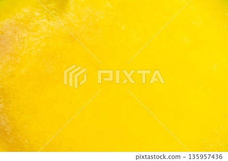 Abstract background of juicy yellow mango fruit flesh. 135957436