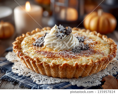 Elegant tart topped with whipped cream and autumn seasonal decor. Luxury pastry dessert presentation. Patisserie branding, holiday treat, food bakery advertising and confectionery dessert menu. 135957814