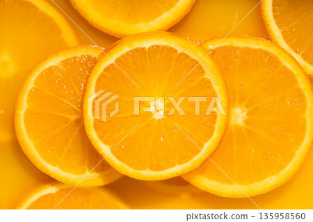 Bright juicy fruity background, oranges drenched in juice Bright juicy fruity background, oranges drenched in juice 135958560