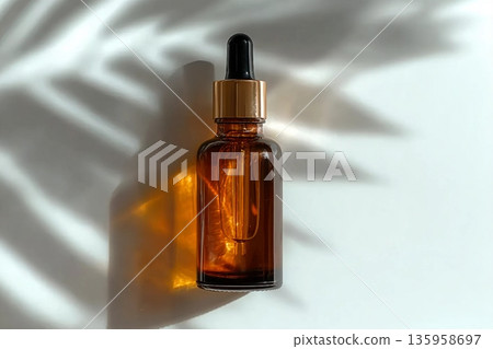 cosmetic makeup bottle serum dropper product with skin care concept on light background in leaf shadows. cosmetic makeup bottle serum dropper product with skin care concept on light background in leaf shadows. 135958697