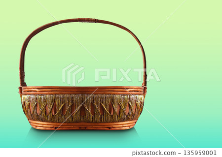 front view oval Wicker Basket Decorated with gold and white thread in the middle on gradient green background, object, decor, fashion, copy space 135959001