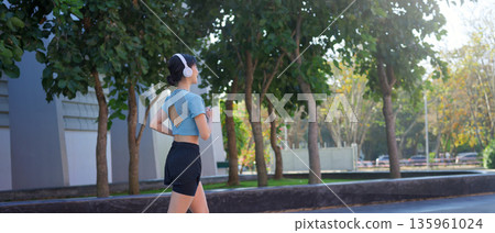 woman running in the park 135961024