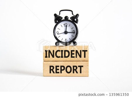 Incident Report symbol. Concept word Incident Report on wooden blocks. Beautiful white background. Business and Incident Report concept. Copy space 135961350