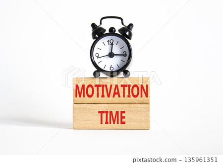 Motivation Time symbol. Concept word Motivation Time on wooden blocks. Beautiful white background with alarm clock. Business and Motivation Time concept. Copy space Motivation Time symbol. Concept word Motivation Time on wooden blocks. Beautiful white background with alarm clock. Business and Motivation Time concept. Copy space 135961351