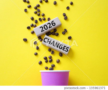 2026 Changes symbol. Concept words 2026 Changes on beautiful wooden picture frame. Beautiful yellow background with coffee cup and coffee beans. Business and 2026 Changes concept. Copy space. 2026 Changes symbol. Concept words 2026 Changes on beautiful wooden picture frame. Beautiful yellow background with coffee cup and coffee beans. Business and 2026 Changes concept. Copy space. 135961371