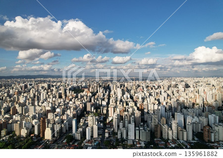 Sweeping view of Sao Paulos skyline under a bright blue sky Sweeping view of Sao Paulos skyline under a bright blue sky 135961882