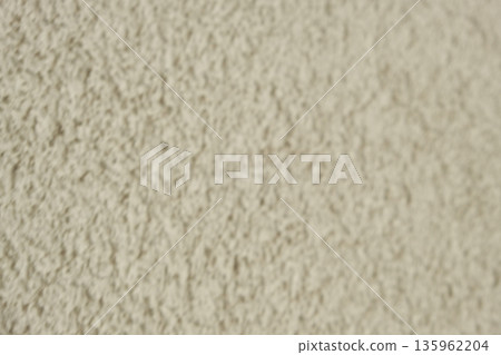 Beige Coarse Plaster Wall Blurred Background Texture Beige Coarse Plaster Wall Blurred Background Texture 135962204