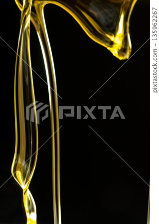 Abstract oil splashes and drips isolated on black for luxury design 135962267
