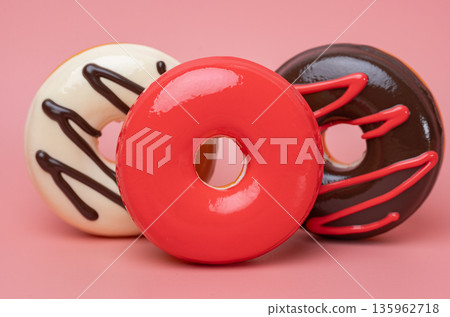 Close-up of glazed donuts Close-up of glazed donuts 135962718
