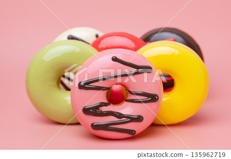 Close-up of glazed donuts Close-up of glazed donuts 135962719