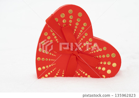 red hearts on the snow 135962823